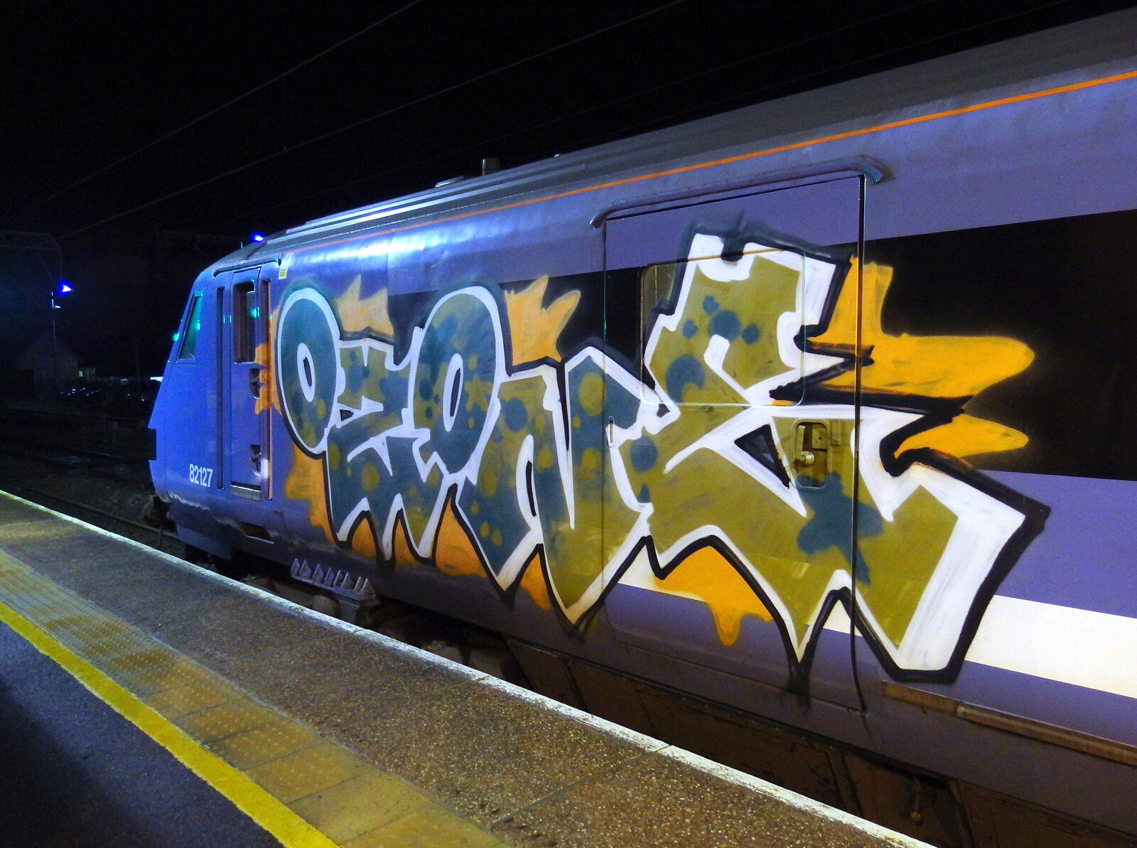 The DVT on the 17:35 at Diss has been tagged with graffiti from A Ross Street Reunion, Hoxne, Suffolk - 25th January 2014