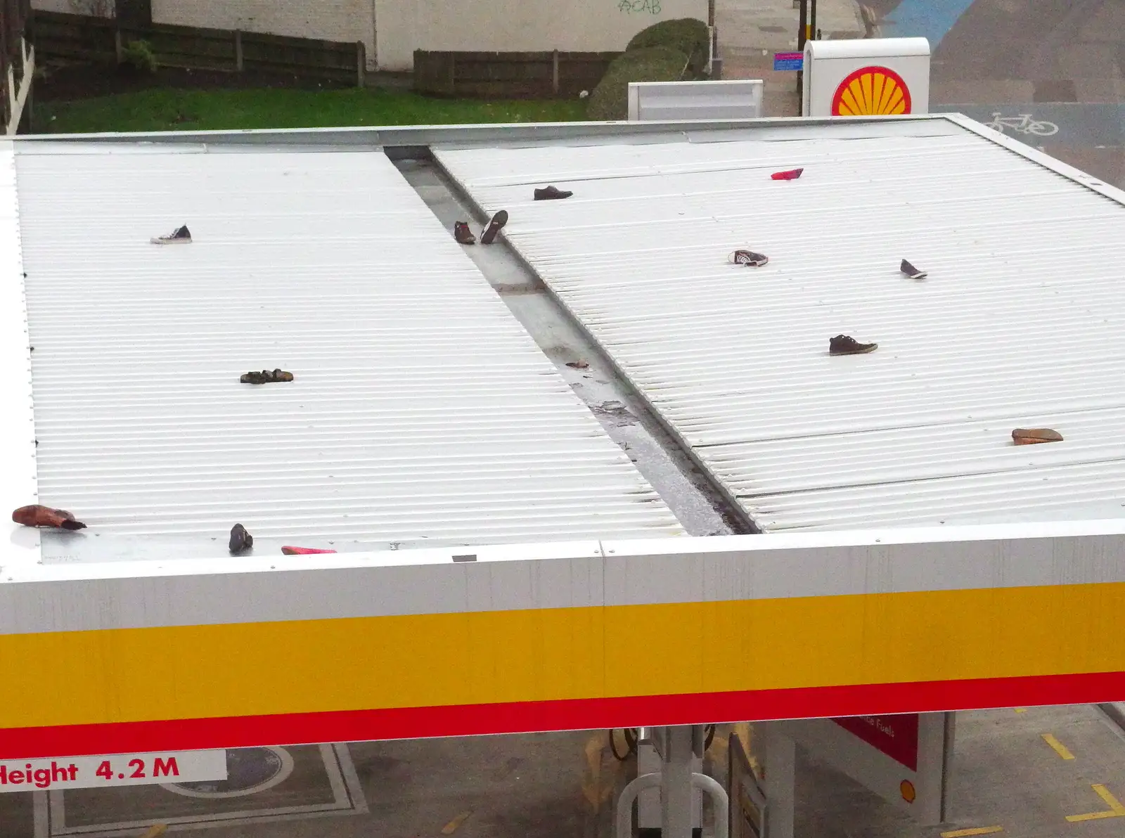 Loads of shoes on the roof of the Shell garage, from A Dragoney Sort of Day, Norwich, Norfolk - 15th February 2014