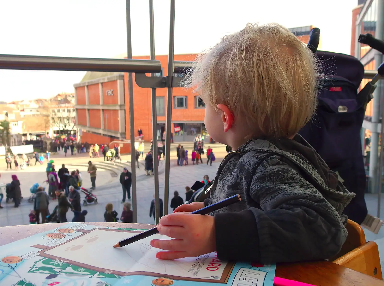 Harry peers out of the window at Pizza Express, from A Dragoney Sort of Day, Norwich, Norfolk - 15th February 2014