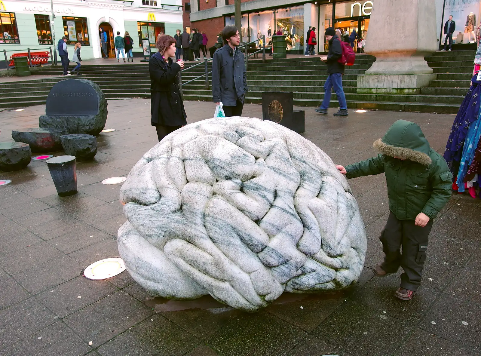 Fred pokes at a giant brain on the Haymarket, from A Dragoney Sort of Day, Norwich, Norfolk - 15th February 2014