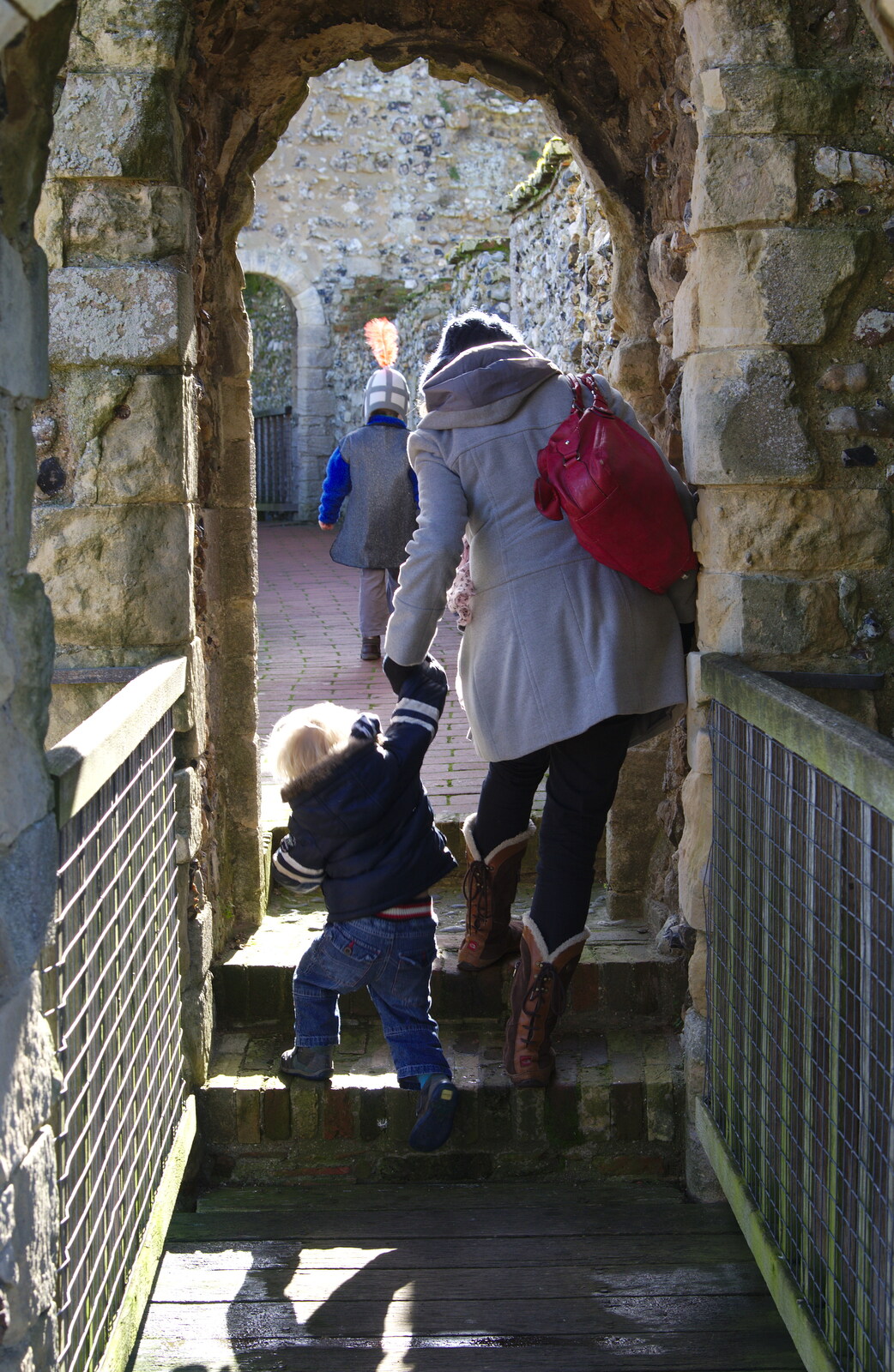 Isobel helps Harry up some steps from A Trip to Framlingham Castle, Framlingham, Suffolk - 16th February 2014