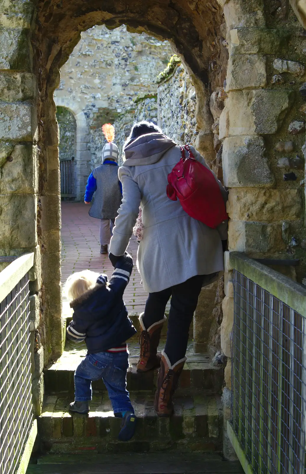 Isobel helps Harry up some steps, from A Trip to Framlingham Castle, Framlingham, Suffolk - 16th February 2014