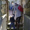 Isobel helps Harry up some steps, A Trip to Framlingham Castle, Framlingham, Suffolk - 16th February 2014