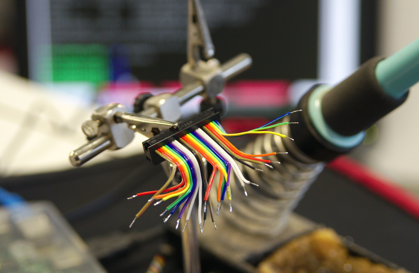 Time for some soldering, on rainbow ribbon cable from SwiftKey Innovation, The Hub, Westminster, London - 21st February 2014
