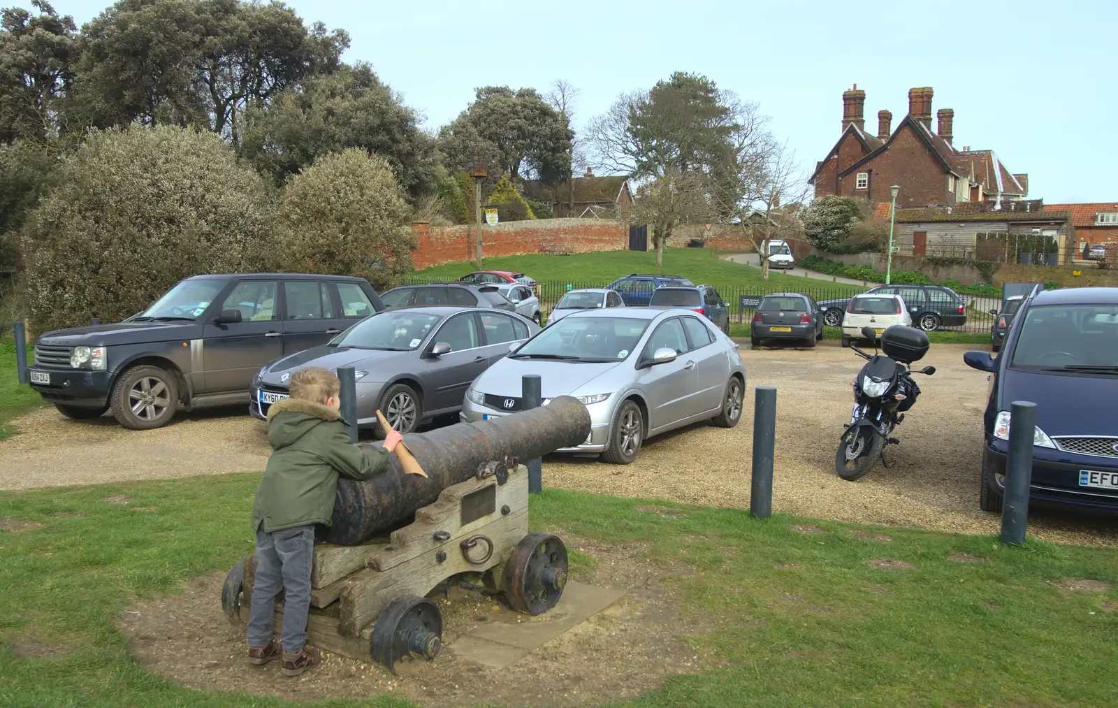 Fred pretends to fire a cannon at the town, from A Trip to Orford Castle, Orford, Suffolk - 2nd March 2014