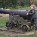 Fred hugs a cannon, A Trip to Orford Castle, Orford, Suffolk - 2nd March 2014