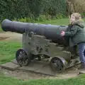 Fred hugs a cannon, A Trip to Orford Castle, Orford, Suffolk - 2nd March 2014