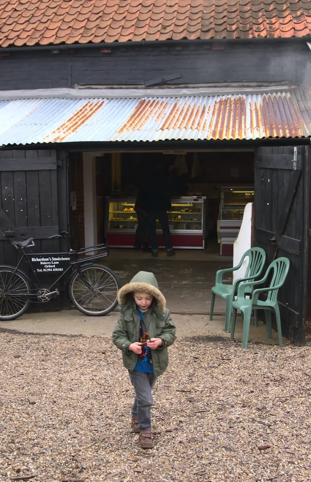 Fred roams around outside the smokehouse, from A Trip to Orford Castle, Orford, Suffolk - 2nd March 2014