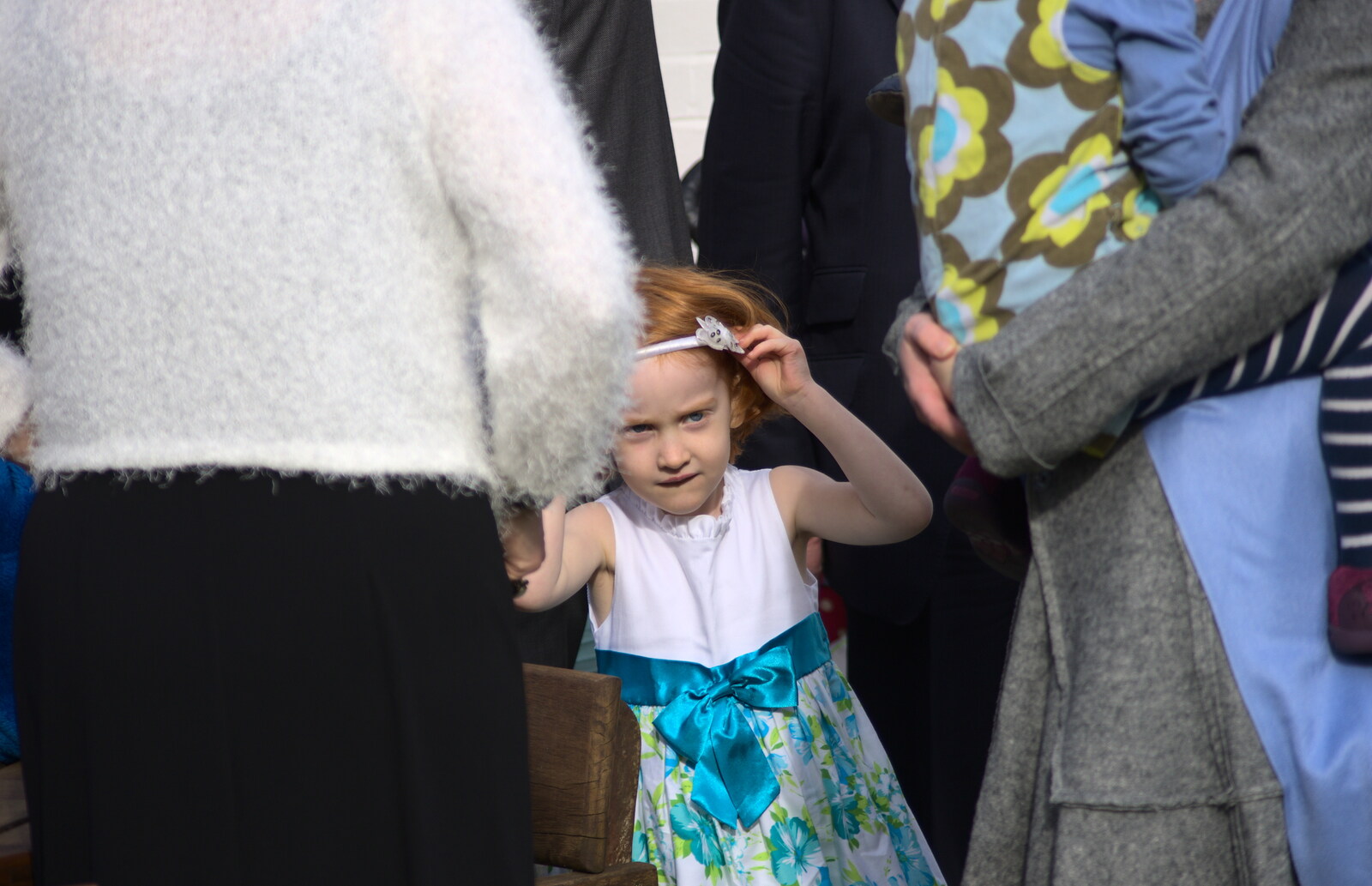Small girl in a big crowd from John and Caroline's Wedding, Sheene Mill, Melbourne, Cambridgeshire - 8th March 2014