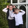 Lucas and a friend pull faces, John and Caroline's Wedding, Sheene Mill, Melbourne, Cambridgeshire - 8th March 2014