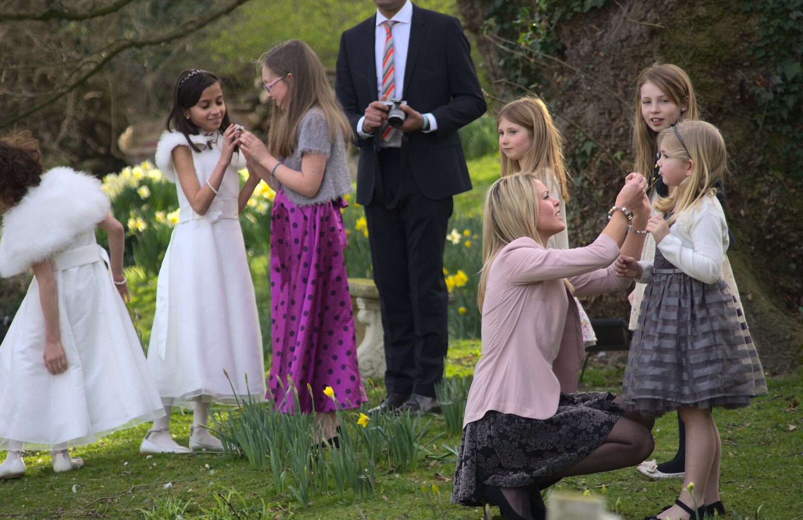 Bridesmaids in the garden from John and Caroline's Wedding, Sheene Mill, Melbourne, Cambridgeshire - 8th March 2014