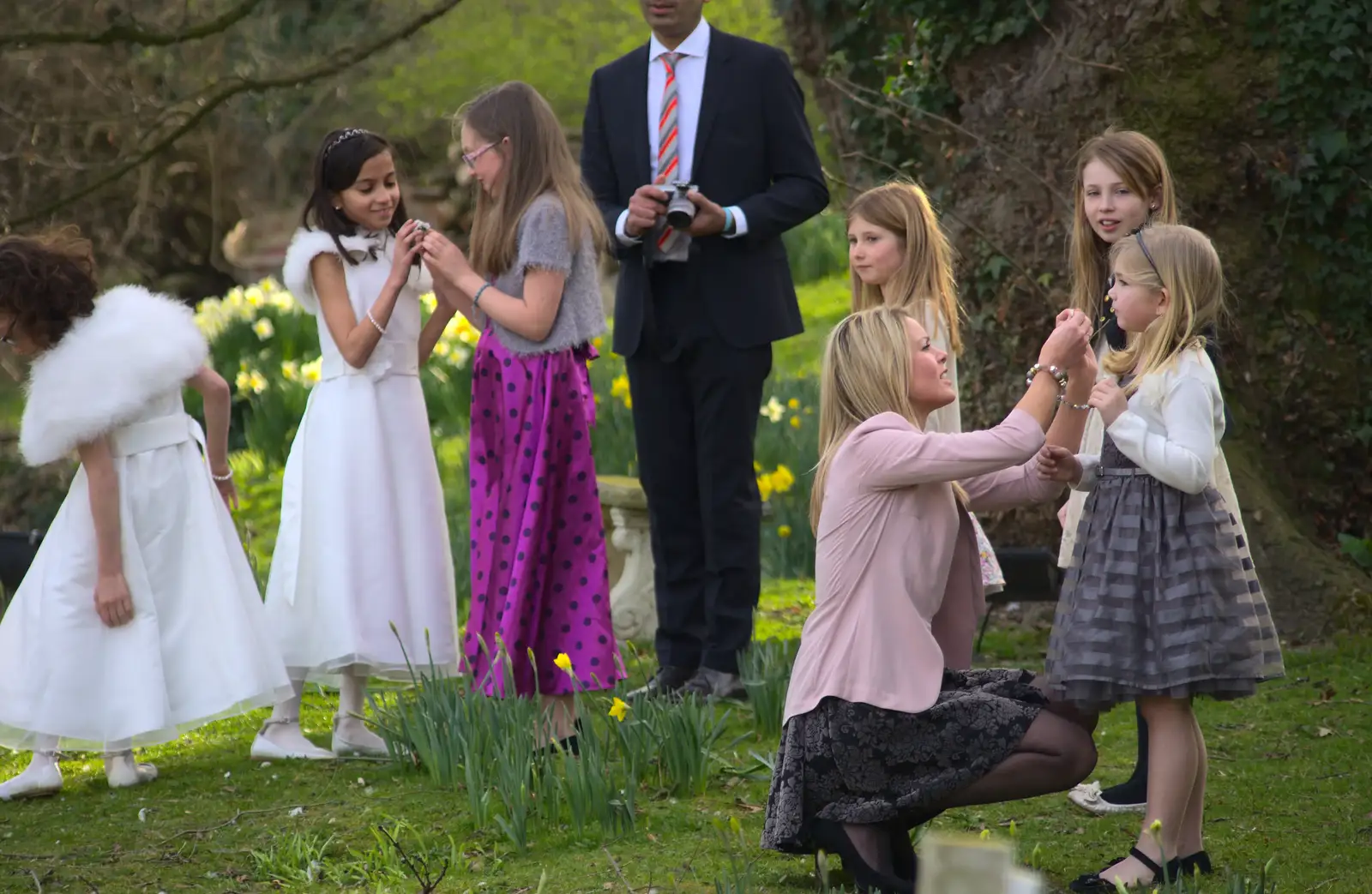 Bridesmaids in the garden, from John and Caroline's Wedding, Sheene Mill, Melbourne, Cambridgeshire - 8th March 2014