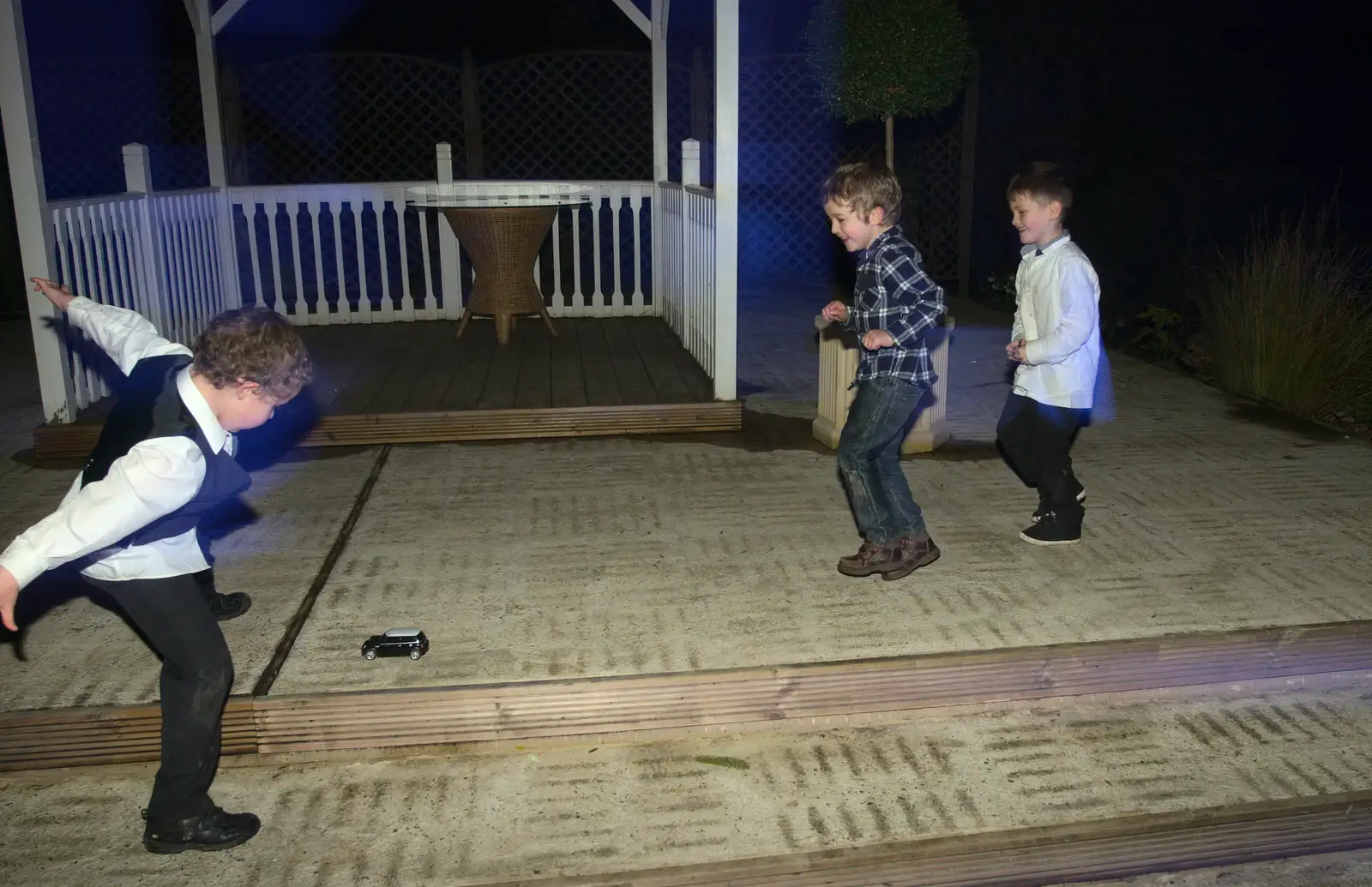 The boys have a remote-control car, from John and Caroline's Wedding, Sheene Mill, Melbourne, Cambridgeshire - 8th March 2014