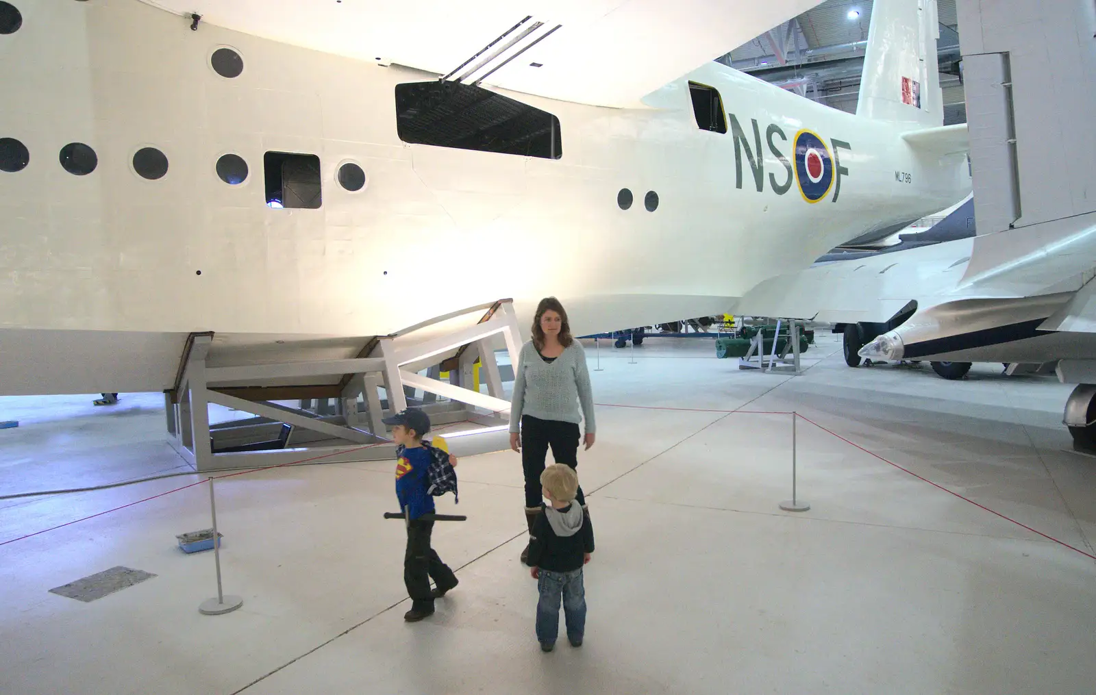 Hanging around under a Sunderland flying boat, from A Day Out at Duxford, Cambridgeshire - 9th March 2014