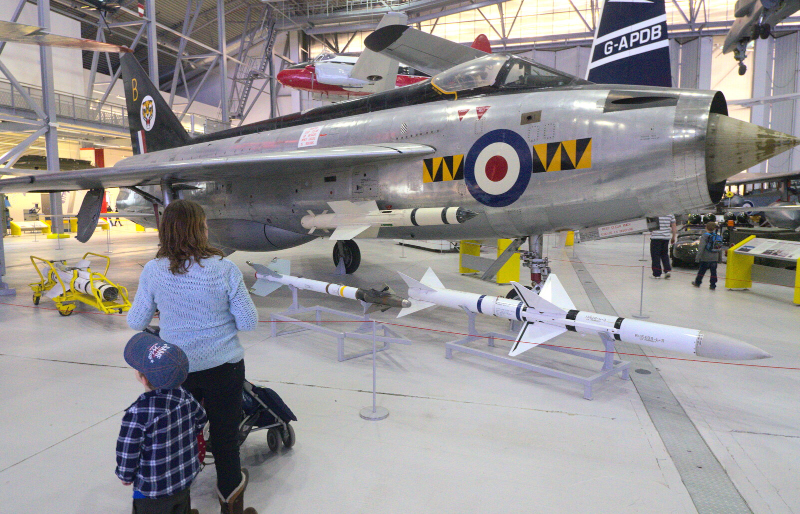 Isobel inspects an English Electric Lightning from A Day Out at Duxford, Cambridgeshire - 9th March 2014