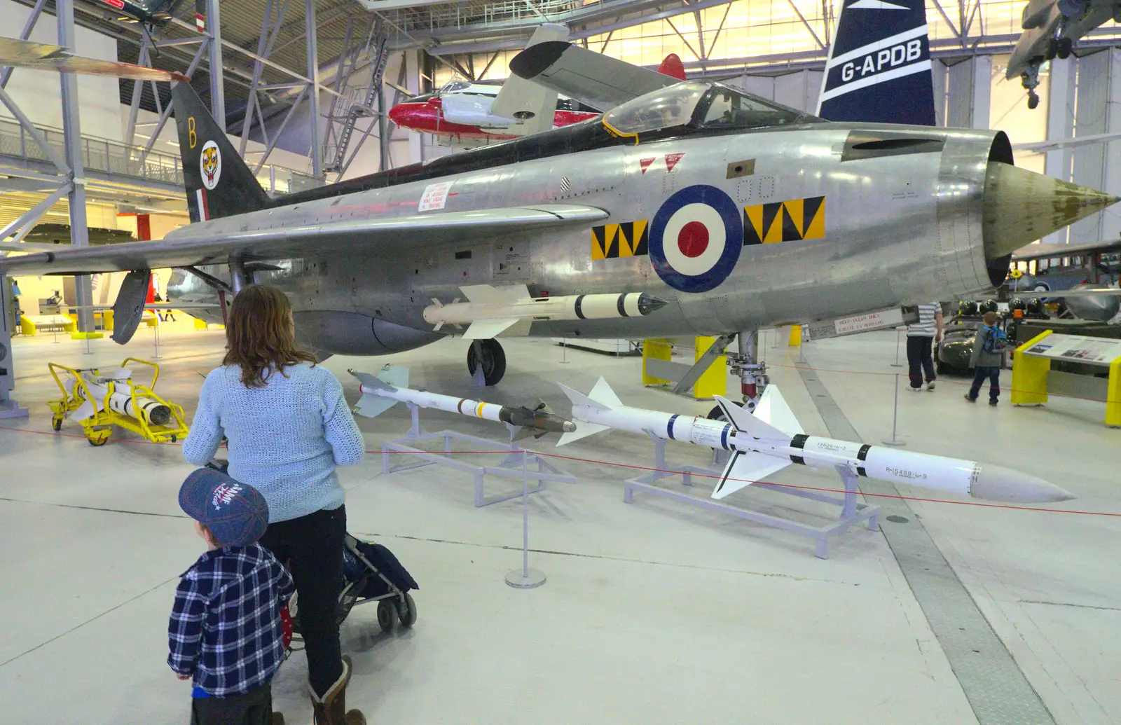 Isobel inspects an English Electric Lightning, from A Day Out at Duxford, Cambridgeshire - 9th March 2014