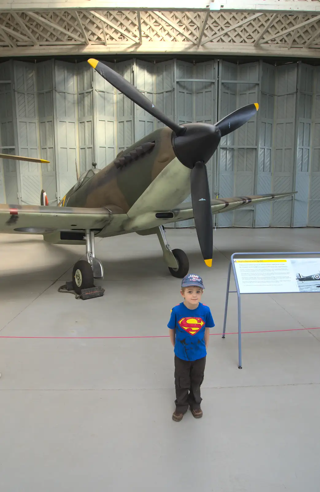 Fred stands in front of a Spitfire, from A Day Out at Duxford, Cambridgeshire - 9th March 2014