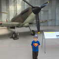 Fred stands in front of a Spitfire, A Day Out at Duxford, Cambridgeshire - 9th March 2014