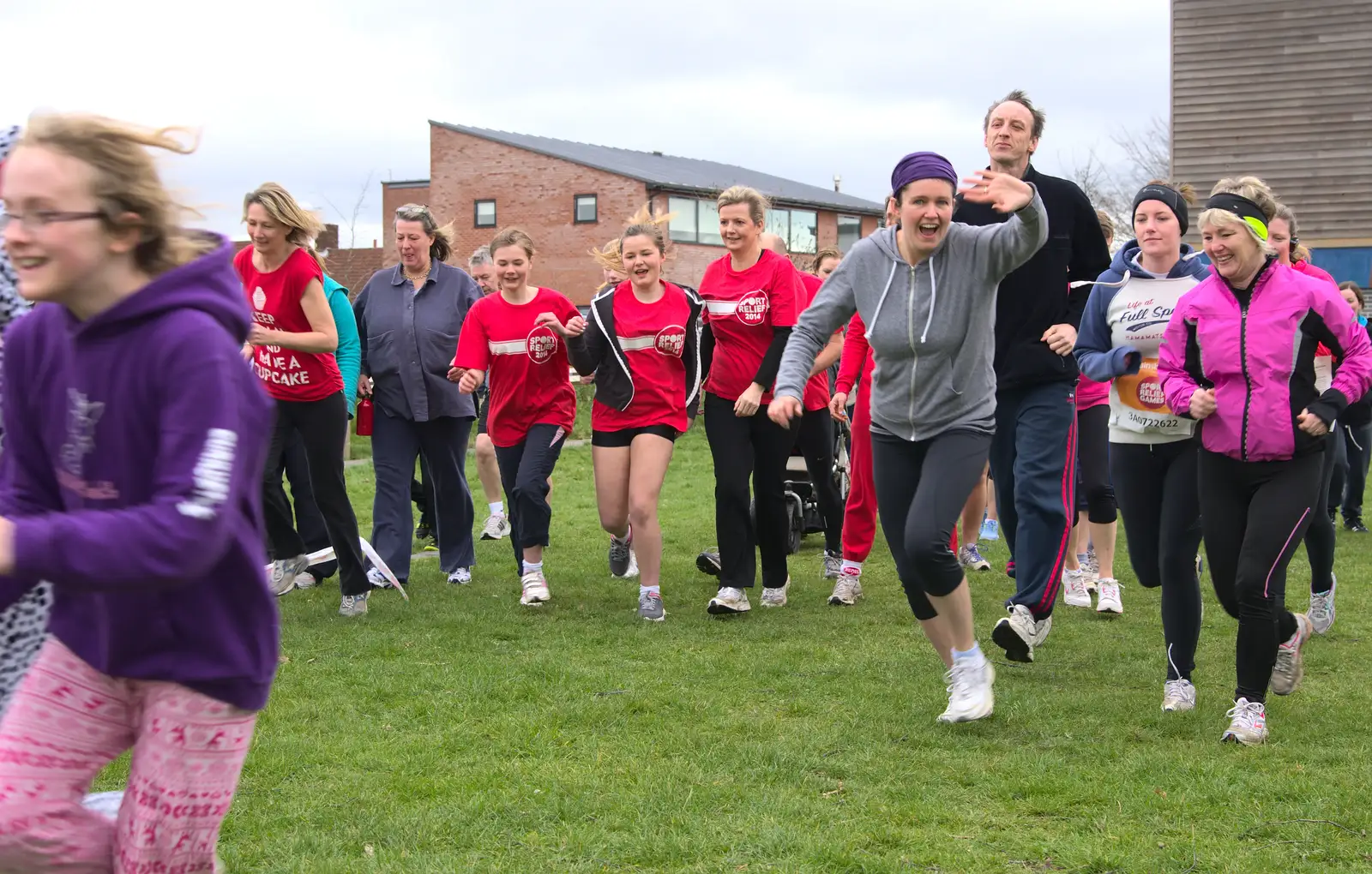 And they're off - Isobel waves on the way past, from Isobel's Fun Run, Hartismere High, Eye, Suffolk - 23rd March 2014