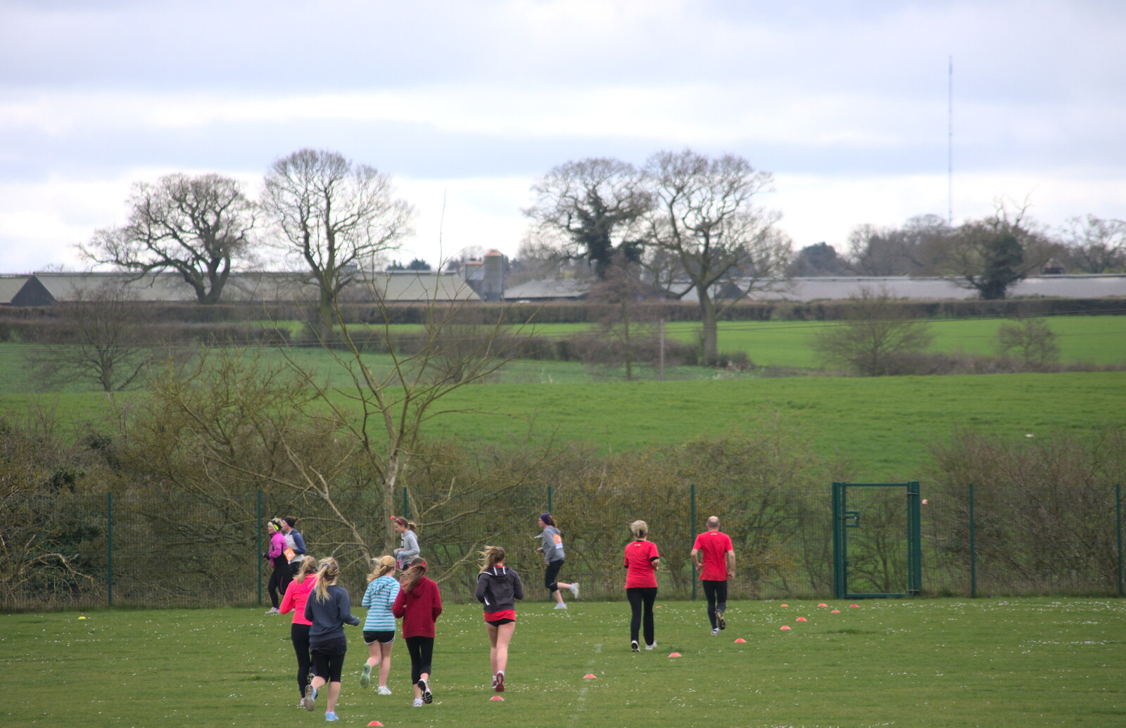 The runners trundle off towards Eye from Isobel's Fun Run, Hartismere High, Eye, Suffolk - 23rd March 2014