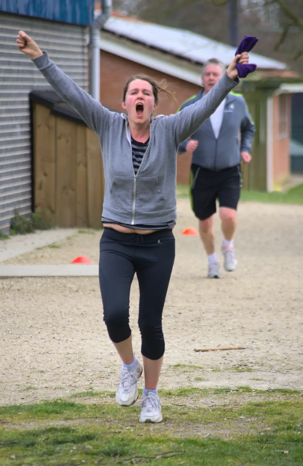 Isobel completes her run, from Isobel's Fun Run, Hartismere High, Eye, Suffolk - 23rd March 2014