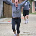 Isobel completes her run, Isobel's Fun Run, Hartismere High, Eye, Suffolk - 23rd March 2014