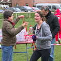 A medal and a bottle of water, Isobel's Fun Run, Hartismere High, Eye, Suffolk - 23rd March 2014