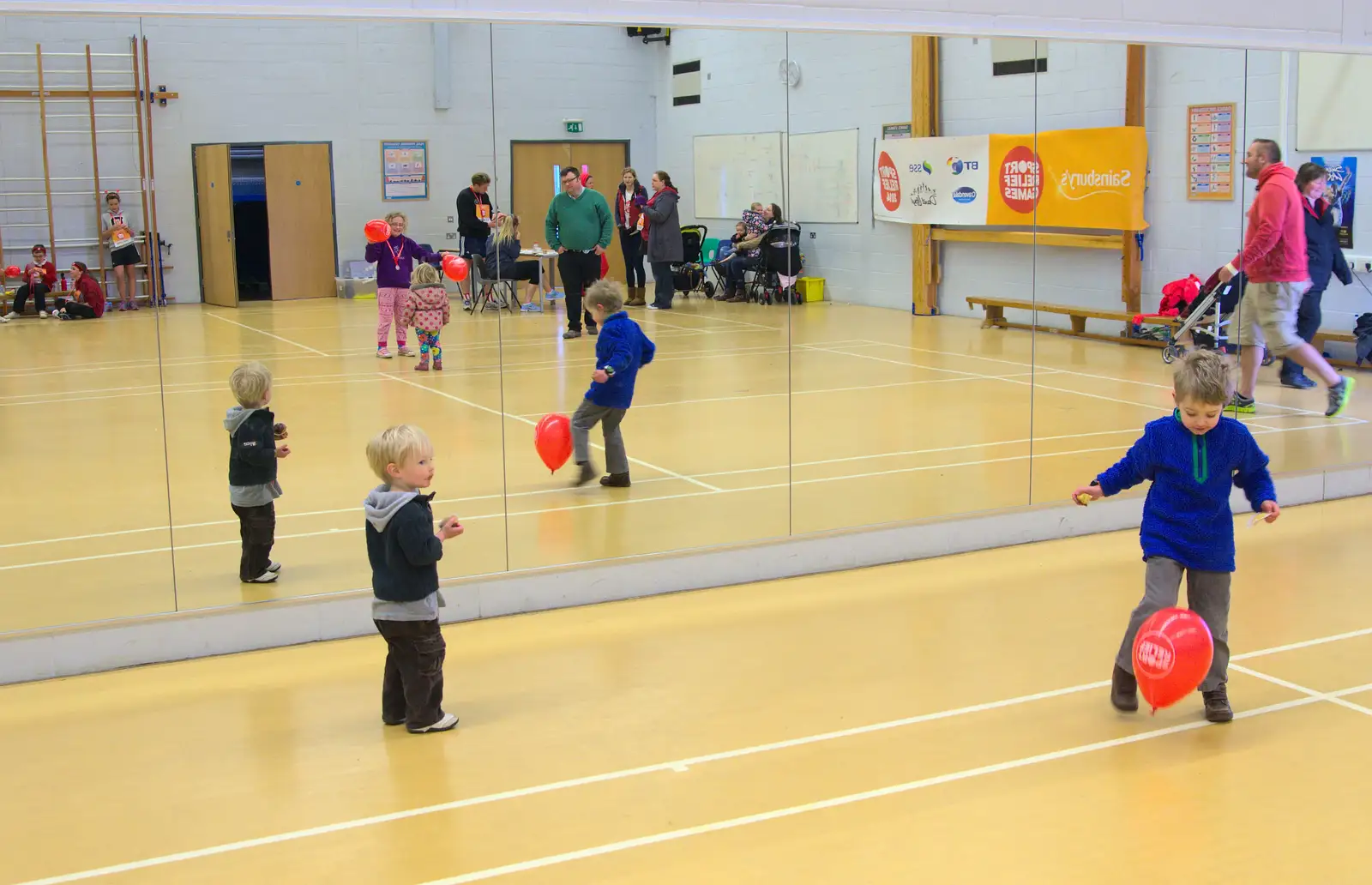 Harry checks himself out in a mirror, from Isobel's Fun Run, Hartismere High, Eye, Suffolk - 23rd March 2014