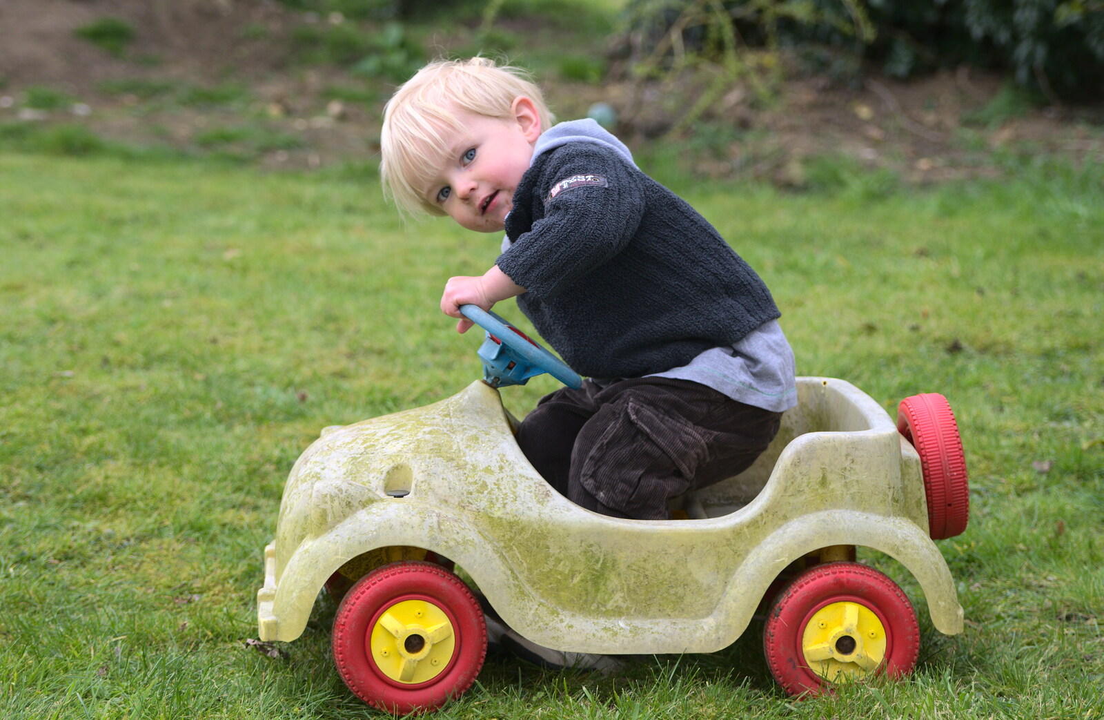 Harry in a push-along car from Isobel's Fun Run, Hartismere High, Eye, Suffolk - 23rd March 2014