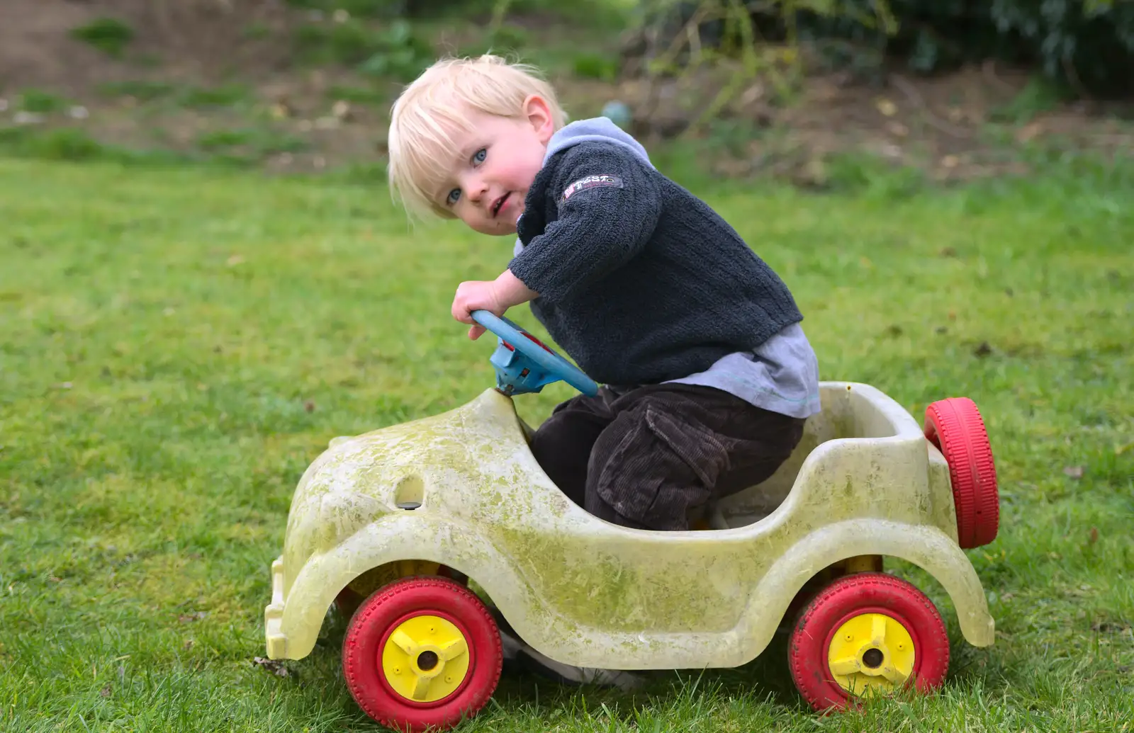 Harry in a push-along car, from Isobel's Fun Run, Hartismere High, Eye, Suffolk - 23rd March 2014