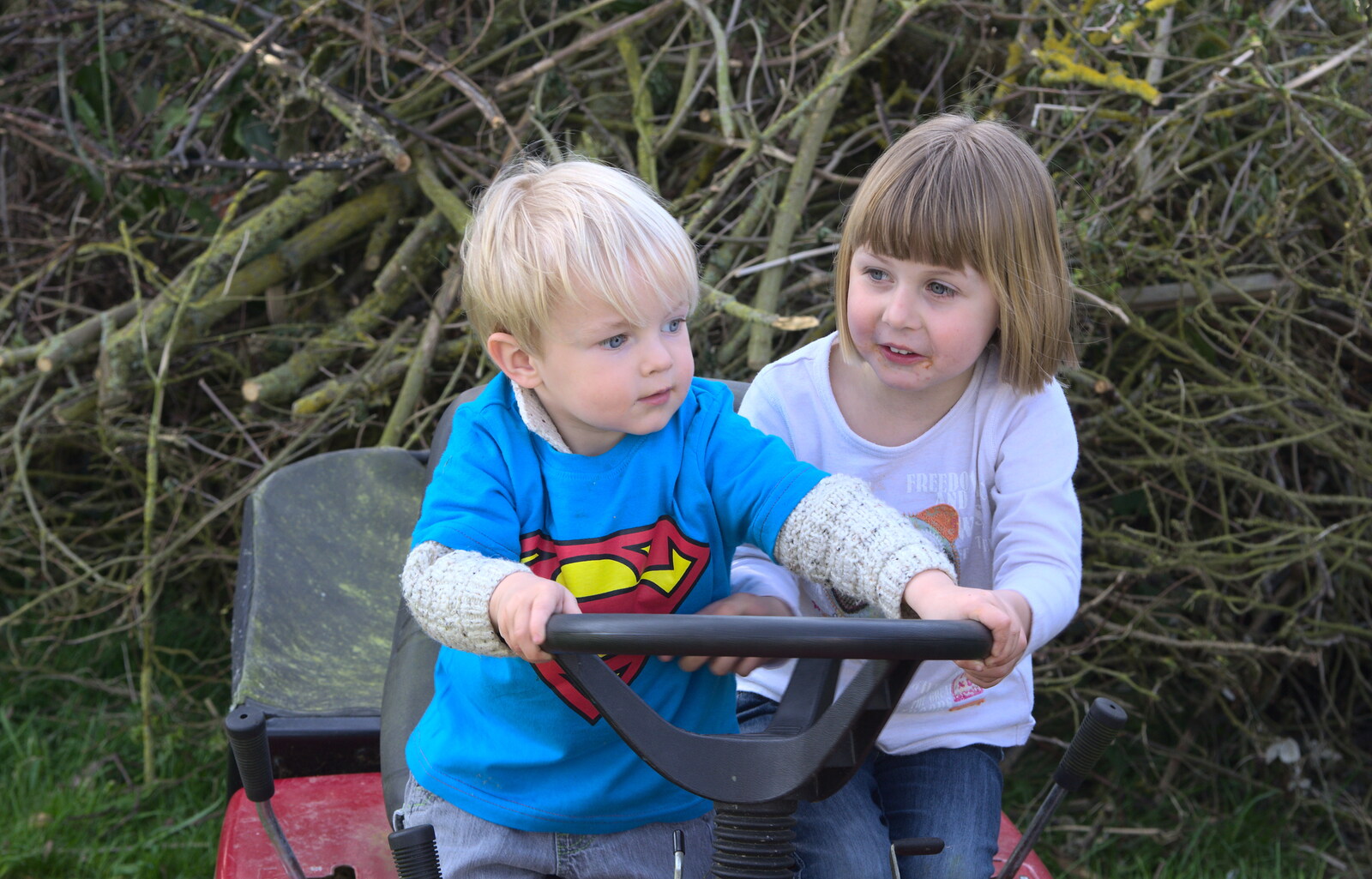 Harry and Sophie wrestle with the steering wheel from On Being Two: Harry's Birthday, Brome, Suffolk - 28th March 2014