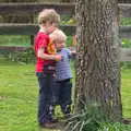 Fred and Harry poke the tree, On Being Two: Harry's Birthday, Brome, Suffolk - 28th March 2014