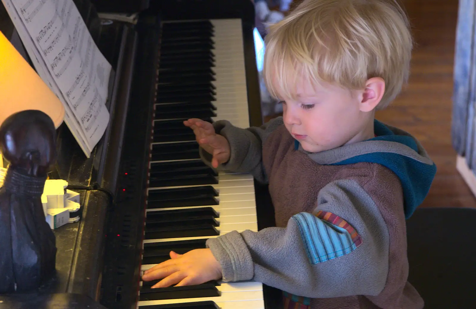 Harry bashes keys on the piano, from On Being Two: Harry's Birthday, Brome, Suffolk - 28th March 2014