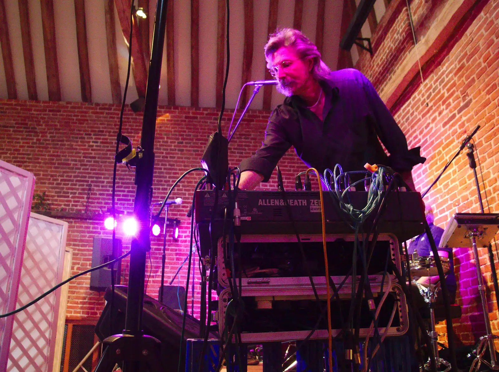 Rob twiddles knobs on the desk, from The BBs Play Haughley Park Barn, Haughley, Suffolk - 26th April 2014