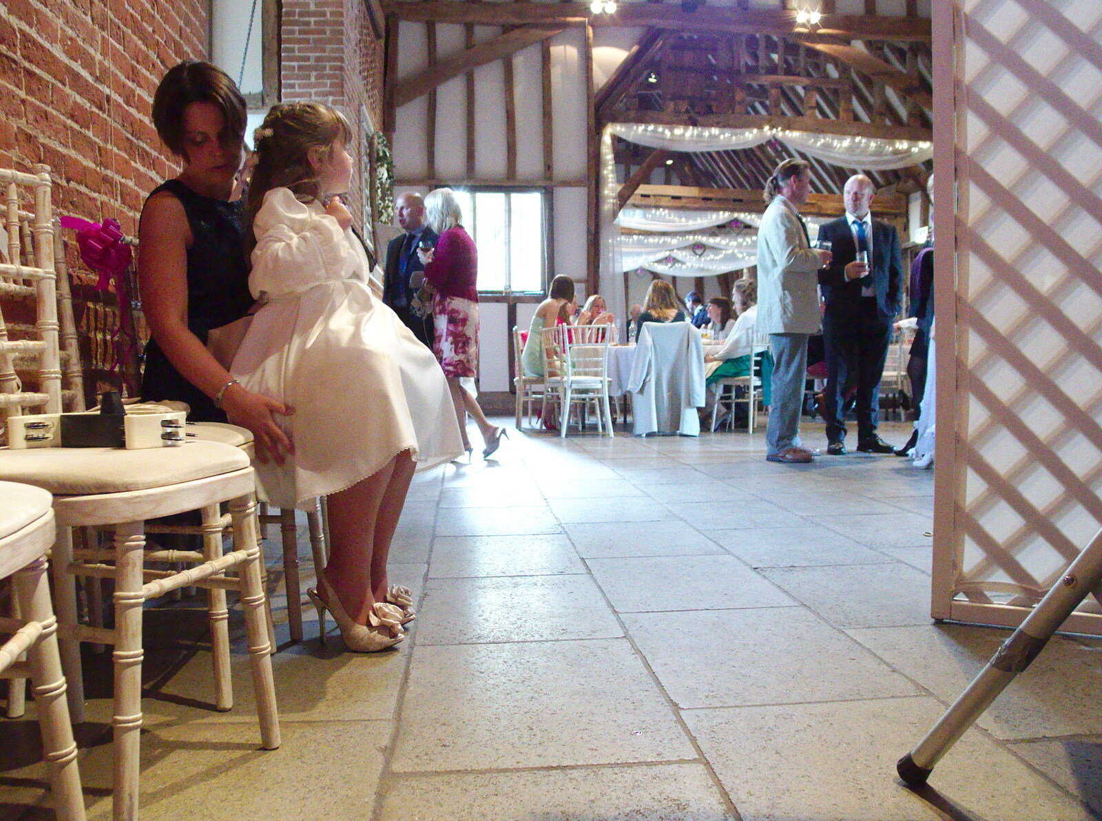Wedding guests mingle around from The BBs Play Haughley Park Barn, Haughley, Suffolk - 26th April 2014