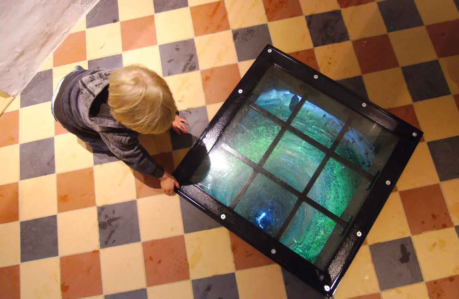 Harry looks down the well at the Oaksmere, from The BSCC at the Burston Crown, and the Oaksmere Re-opens, Brome, Suffolk - 1st May 2014