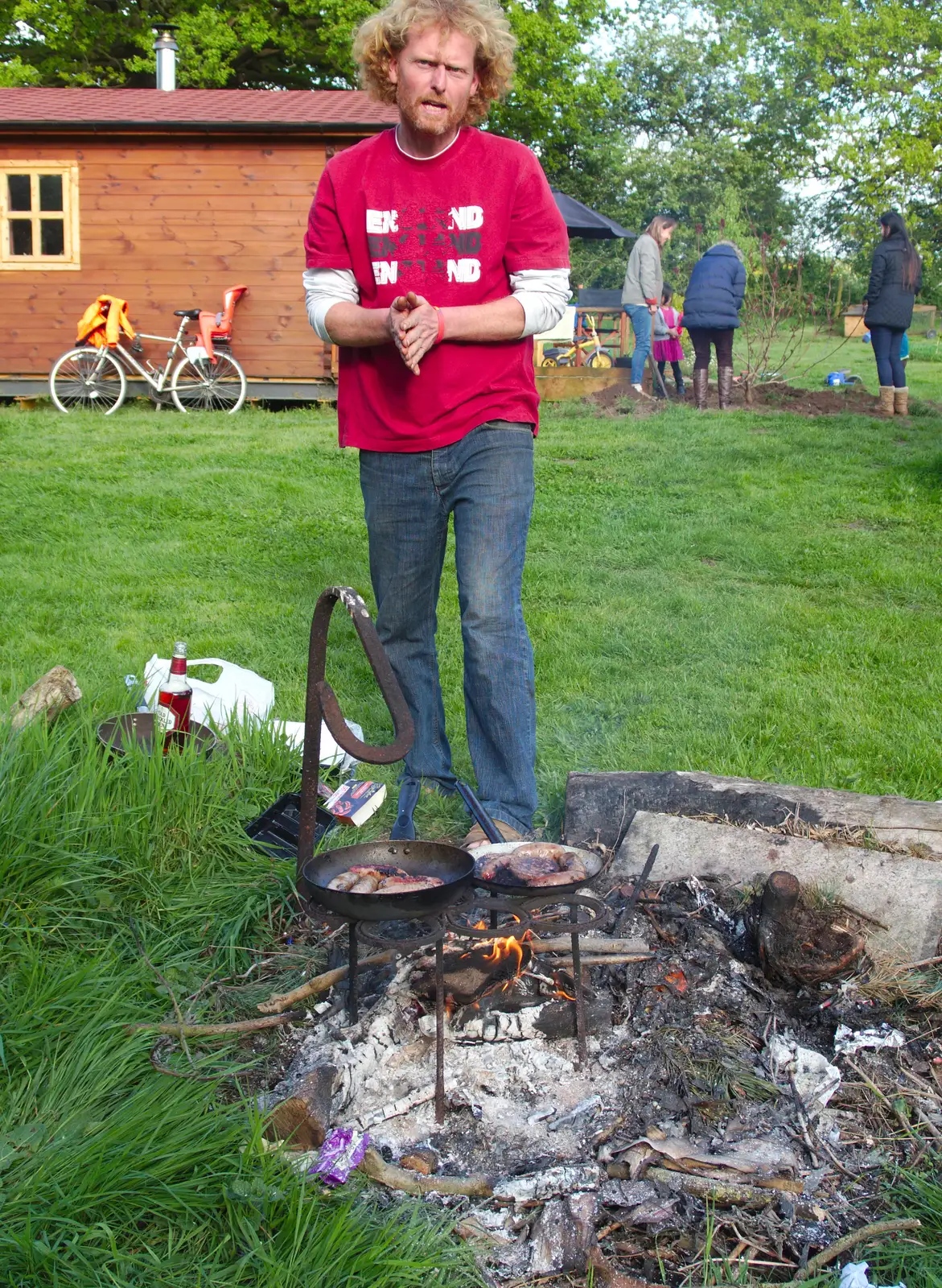 Wavy keeps an eye on sausages, from BBs' Coldest Gig and a Wavy Barbeque, Botesdale and Stuston, Suffolk, 3rd May 2014