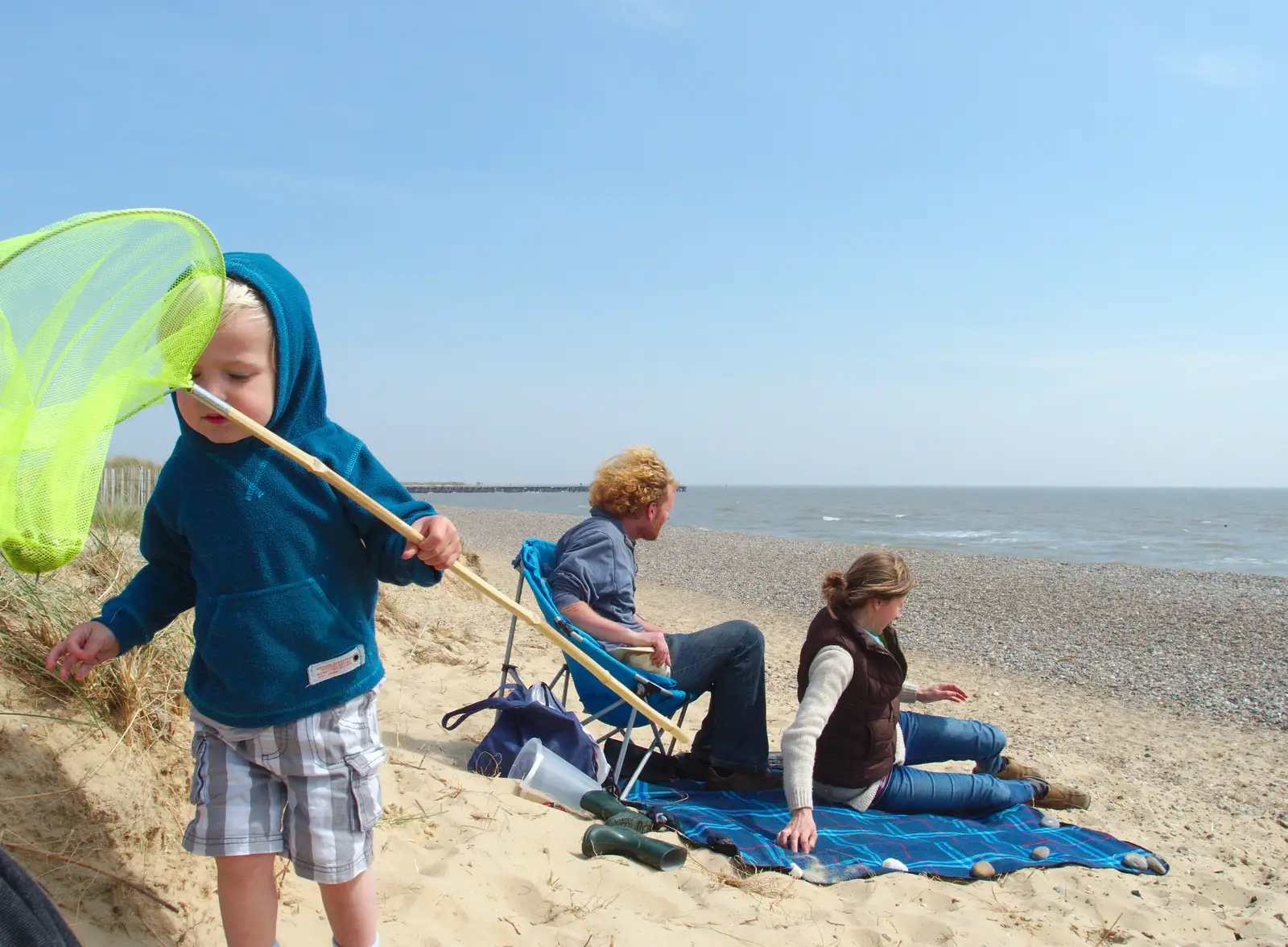 Harry wanders off with his net, from Life's A Windy Beach, Walberswick, Suffolk - 5th May 2014