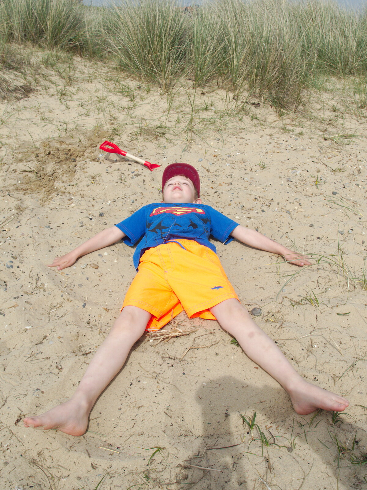 Fred does sand angels from Life's A Windy Beach, Walberswick, Suffolk - 5th May 2014