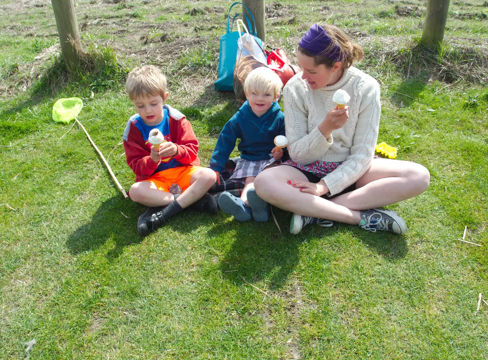 Isobel and the boys eat ice cream, from Life's A Windy Beach, Walberswick, Suffolk - 5th May 2014