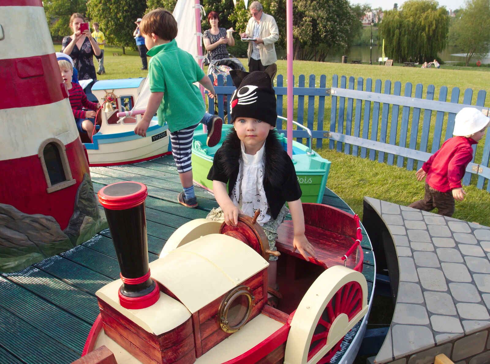 Harry's on a roundabout from A Family Fun Day on the Park, Diss, Norfolk - 16th May 2014