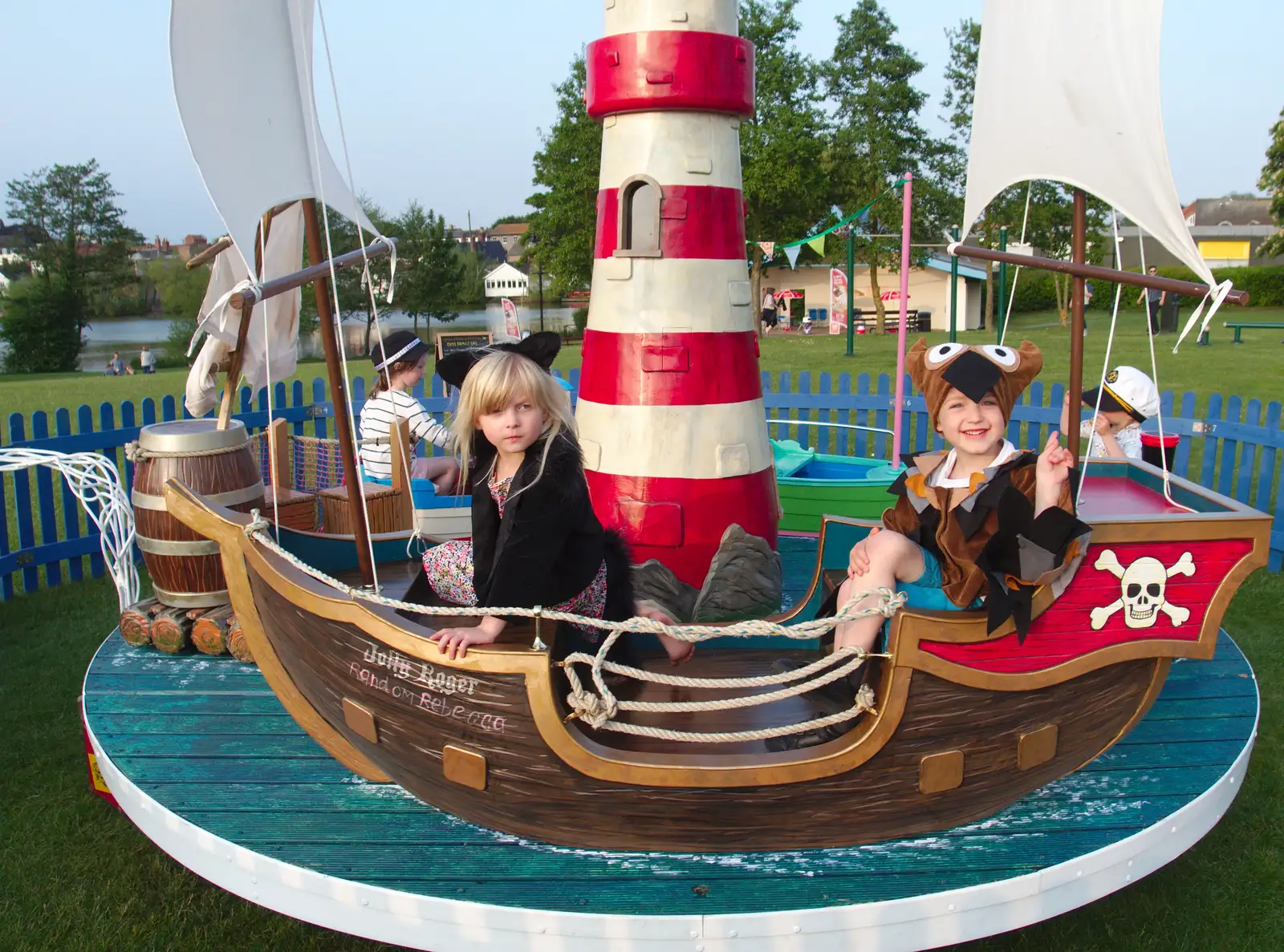 Fred and Milly on the roundabout, from A Family Fun Day on the Park, Diss, Norfolk - 16th May 2014