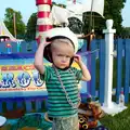 Harry tries a sailor hat on, A Family Fun Day on the Park, Diss, Norfolk - 16th May 2014