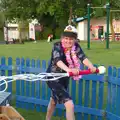 Isobel has a go at pushing, A Family Fun Day on the Park, Diss, Norfolk - 16th May 2014