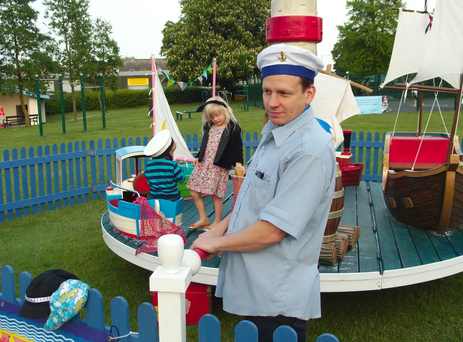 Ed takes a turn at pushing, from A Family Fun Day on the Park, Diss, Norfolk - 16th May 2014