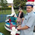 Ed takes a turn at pushing, A Family Fun Day on the Park, Diss, Norfolk - 16th May 2014