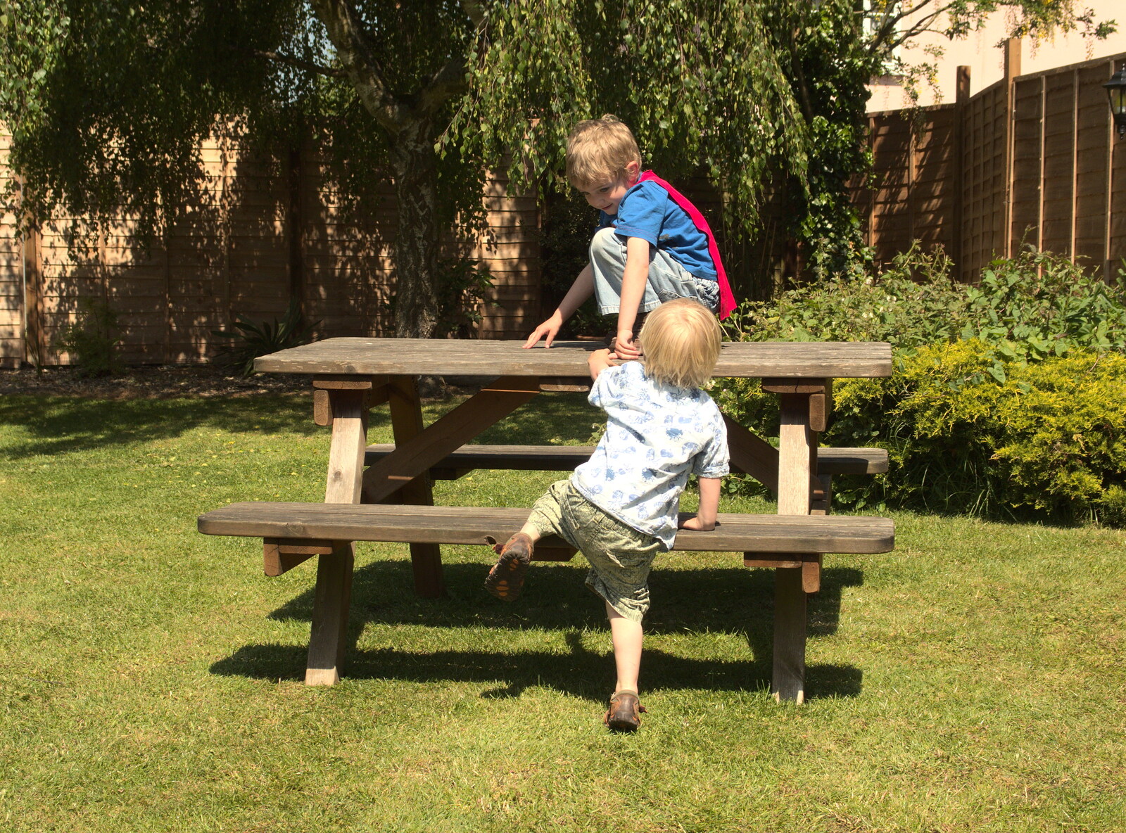 The boys climb on an empty table from Thornham Four Horseshoes, and the Oaksmere, Brome, Suffolk - 17th May 2014