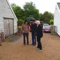 Max and Rob hide under an umbrella, The BBs Play Scrabble at Wingfield Barns, Wingfield, Suffolk - 24th May 2014