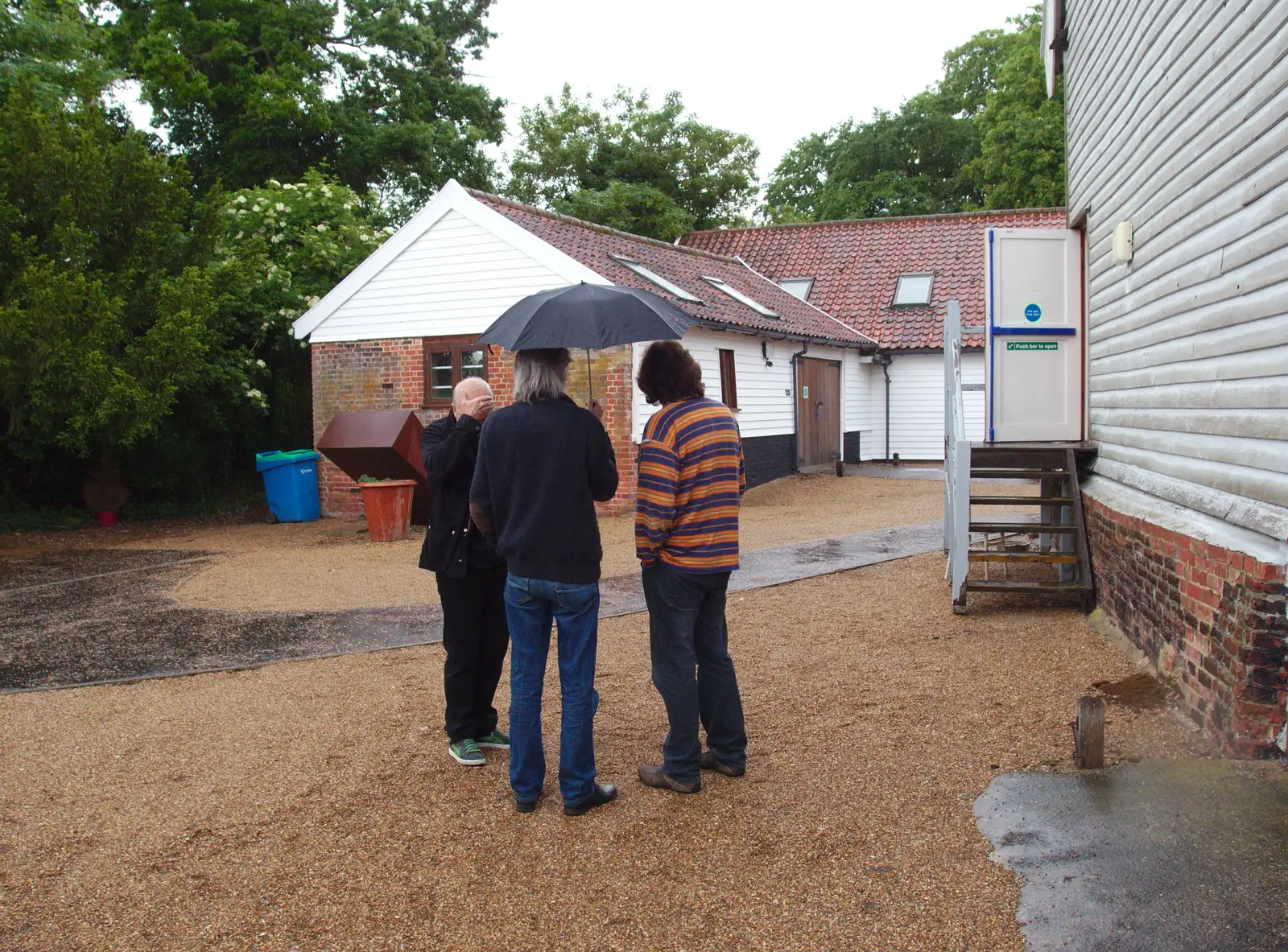 More under-umbrella action, from The BBs Play Scrabble at Wingfield Barns, Wingfield, Suffolk - 24th May 2014