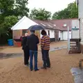 More under-umbrella action, The BBs Play Scrabble at Wingfield Barns, Wingfield, Suffolk - 24th May 2014